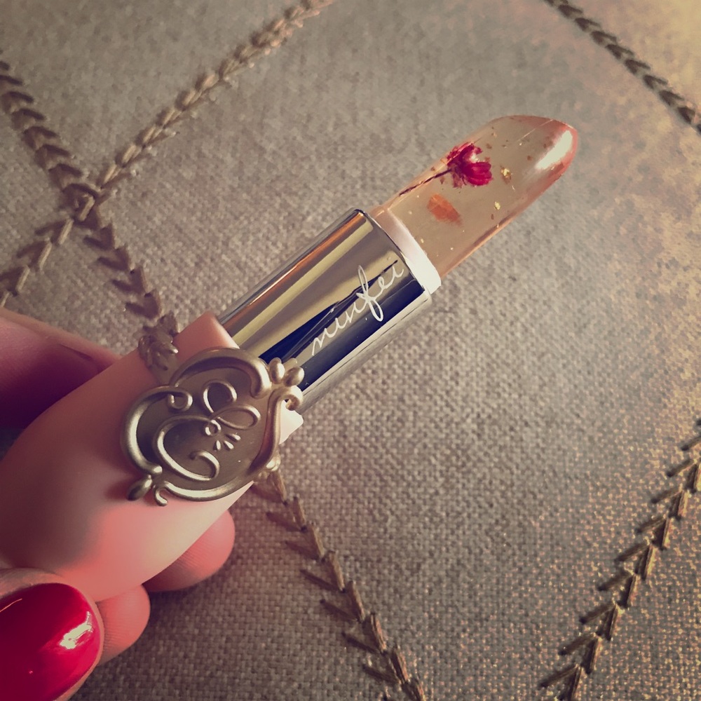 Beautiful lipstick with flower inside